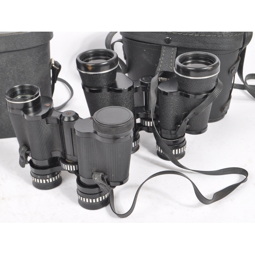 334 - A collection of vintage 20th century binoculars. Three in total with some cased, together with a Hal... 