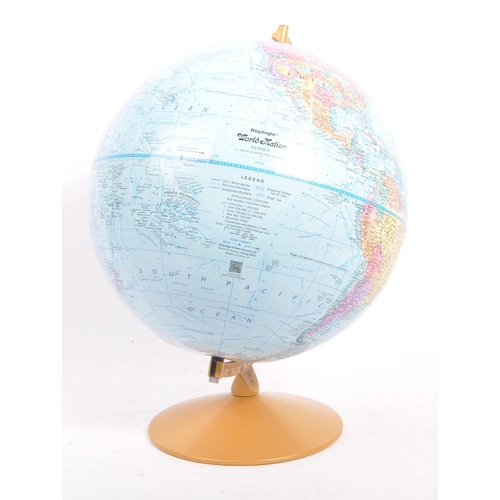 337 - Replogle World Nation Globe - A late 20th century desk top world rotating globe. Spherical form with... 