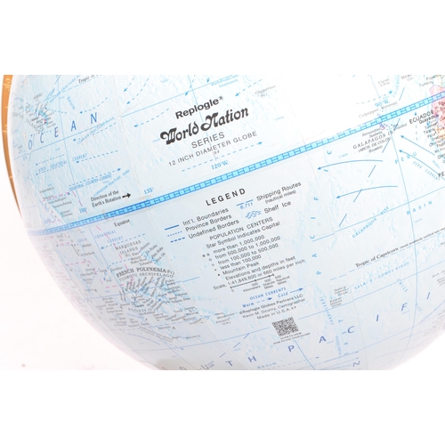 337 - Replogle World Nation Globe - A late 20th century desk top world rotating globe. Spherical form with... 