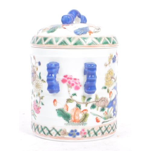 34 - An early 20th century circa 1920s Chinese porcelain tea caddy. The caddy having a white ground, with... 