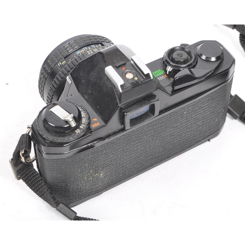 341 - Pentax - Two 20th century Pentax 35mm SLR film cameras, with lenses. The collection to include a Pen... 