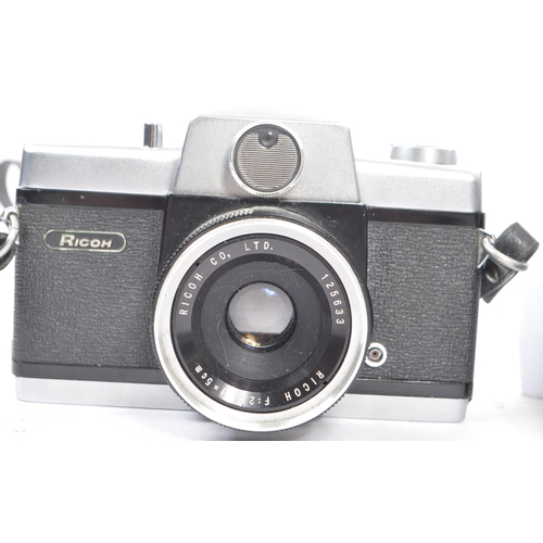 342 - A collection of 20th century Japanese 35mm SLR film cameras, including Ricoh. The collection consist... 