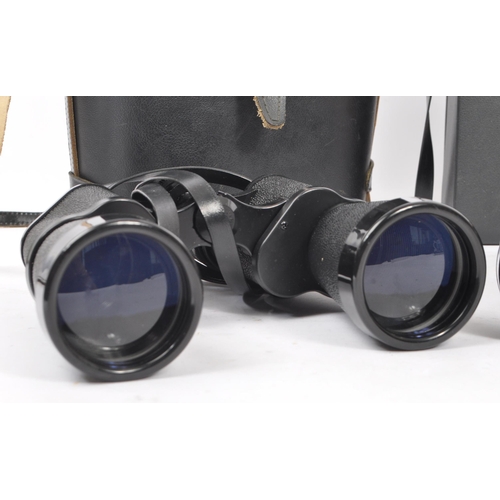 347 - A collection of three mid 20th century binoculars. To include a Prinz 10x50, Super Zenith 20x50, Boo... 