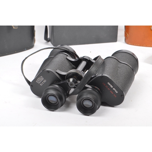 347 - A collection of three mid 20th century binoculars. To include a Prinz 10x50, Super Zenith 20x50, Boo... 