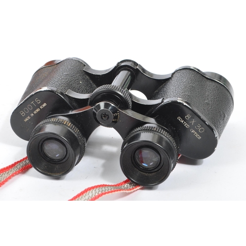 347 - A collection of three mid 20th century binoculars. To include a Prinz 10x50, Super Zenith 20x50, Boo... 