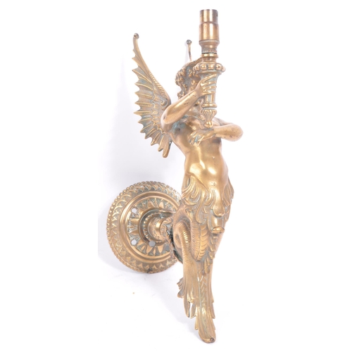 353 - An early 20th century circa 1930s mythical mythological siren / mermaid brass wall sconce. The sconc... 