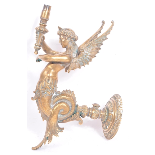 353 - An early 20th century circa 1930s mythical mythological siren / mermaid brass wall sconce. The sconc... 