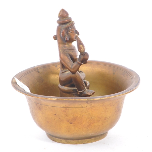 354 - An early 20th century Indian bronze bowl incense burner with sitting deity figurine to center. The f... 