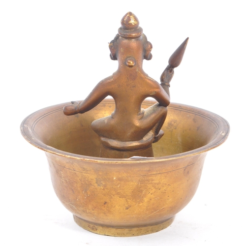 354 - An early 20th century Indian bronze bowl incense burner with sitting deity figurine to center. The f... 