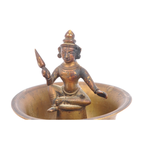 354 - An early 20th century Indian bronze bowl incense burner with sitting deity figurine to center. The f... 