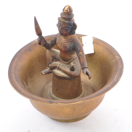 354 - An early 20th century Indian bronze bowl incense burner with sitting deity figurine to center. The f... 