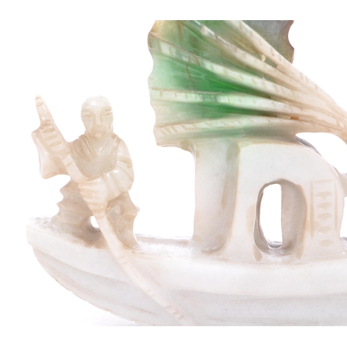 360 - A 20th century carved Chinese Oriental green jade sailor / boat figurine. Measures approx. 9cm x 6.5... 