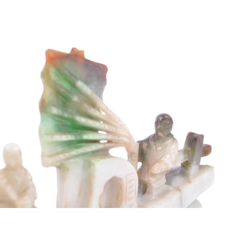 360 - A 20th century carved Chinese Oriental green jade sailor / boat figurine. Measures approx. 9cm x 6.5... 