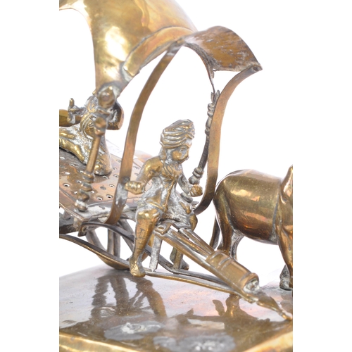 365 - A mid 20th Century brass deities Krishna cart diorama showpiece with buffalos. Measures 15.5cm x 15.... 