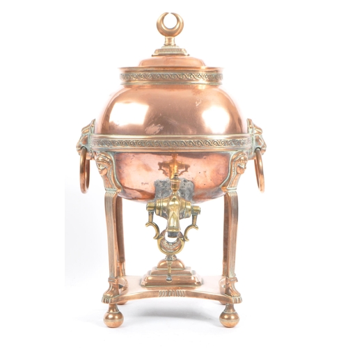 367 - An 19th century Victorian anglo Indian brass and copper samovar. Terraced base with copper finial fe... 