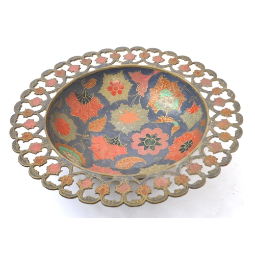 371 - A vintage 20th century Indian brass enamelled charger. Together with two pierced bowls. Having polyc... 