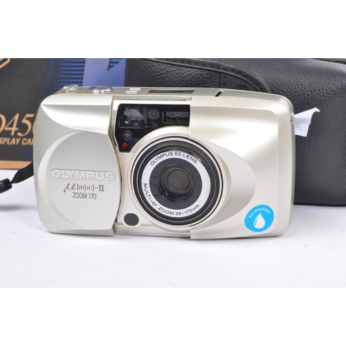 378 - Olympus - M II - zoom 170 all weather 33mm compact point and shoot camera. Together with a video cam... 