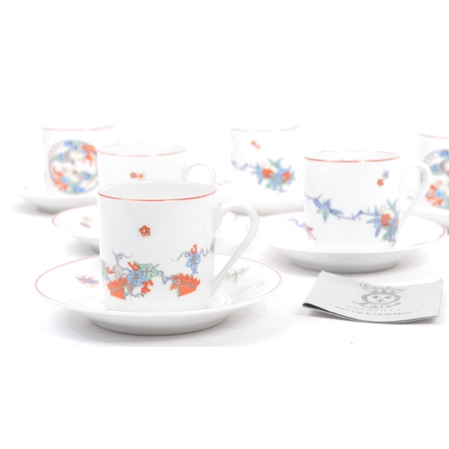 38 - Limoges - A 20th century porcelain ceramic coffee and saucer set for six by Limoges. Six matching cu... 