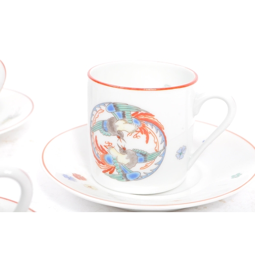 38 - Limoges - A 20th century porcelain ceramic coffee and saucer set for six by Limoges. Six matching cu... 