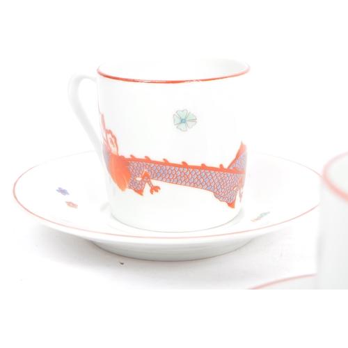 38 - Limoges - A 20th century porcelain ceramic coffee and saucer set for six by Limoges. Six matching cu... 