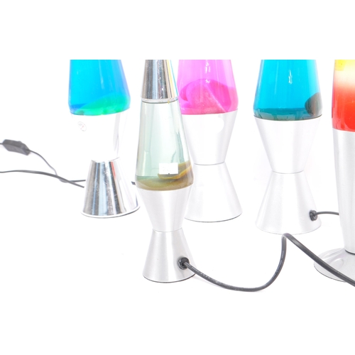 392 - Five later 20th century lava desk table lamp lights. The lot comprising of five electrical lava lamp... 