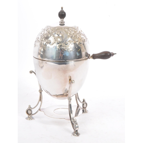 396 - An early 20th century sheffield EPNS silver plated flambe stove / burner and egg coddler. The burner... 