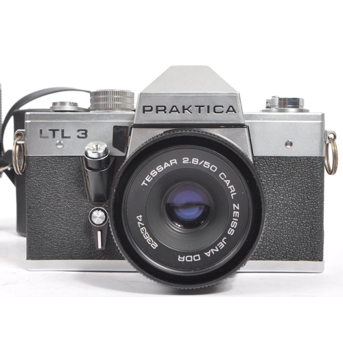 397 - Praktica - A collection of 20th century 35mm SLR film cameras and lenses. The collection to include ... 