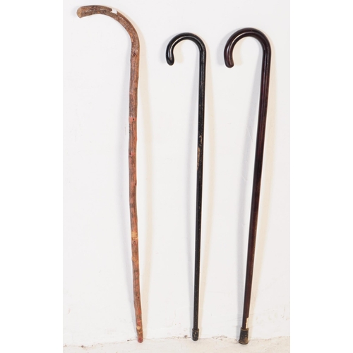 399 - A collection of vintage 20th century & later walking sticks / swagger canes. Comprising of hook hand... 