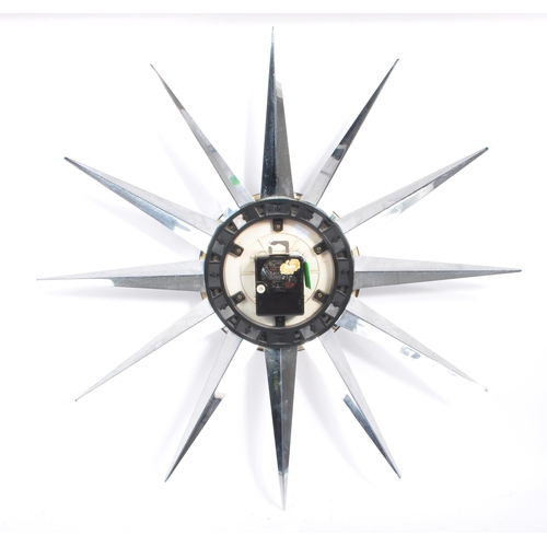 400 - Metamec - An original retro vintage 20th Century sunburst / starburst wall clock by Metamec. Central... 