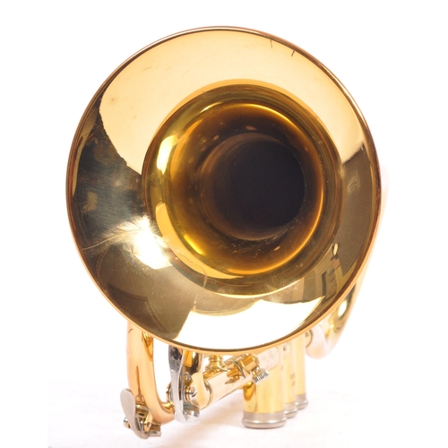 405 - A brass cornet by Yamaha the 'Dulcet with mouth-piece in black rexine vinyl covered case. Instrument... 