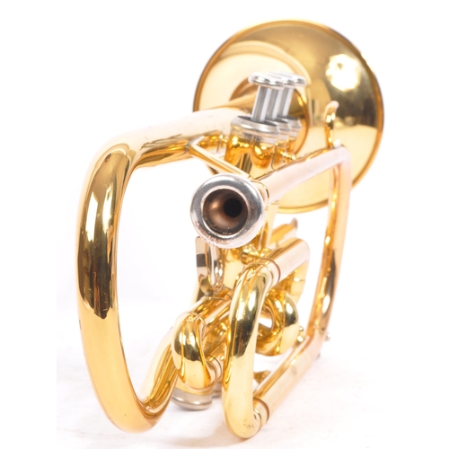 405 - A brass cornet by Yamaha the 'Dulcet with mouth-piece in black rexine vinyl covered case. Instrument... 