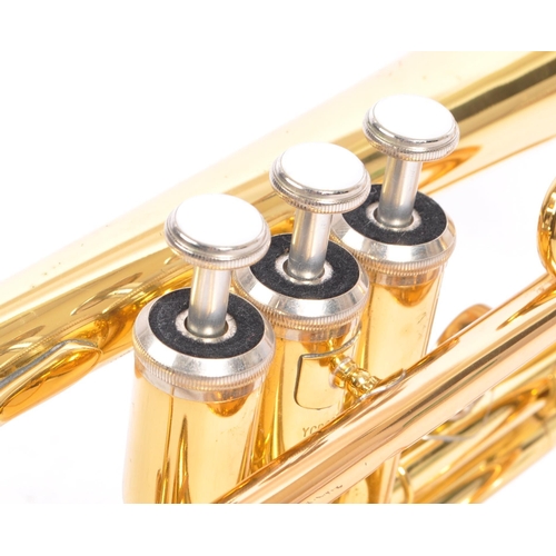 405 - A brass cornet by Yamaha the 'Dulcet with mouth-piece in black rexine vinyl covered case. Instrument... 