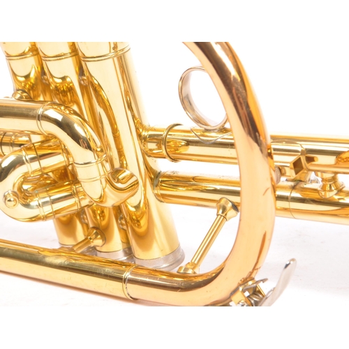 405 - A brass cornet by Yamaha the 'Dulcet with mouth-piece in black rexine vinyl covered case. Instrument... 