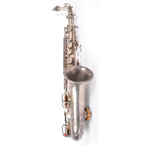 409 - Elkhart, Indiana - Pan American made Saxophone. A early 20th century vintage 20th century white meta... 