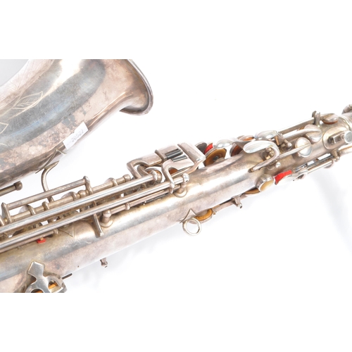 409 - Elkhart, Indiana - Pan American made Saxophone. A early 20th century vintage 20th century white meta... 