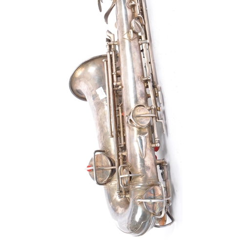 409 - Elkhart, Indiana - Pan American made Saxophone. A early 20th century vintage 20th century white meta... 