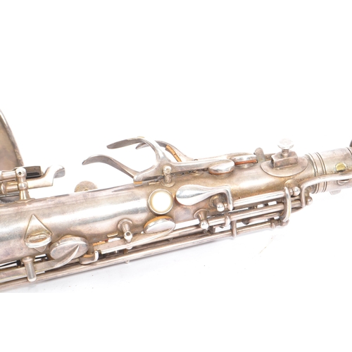 409 - Elkhart, Indiana - Pan American made Saxophone. A early 20th century vintage 20th century white meta... 