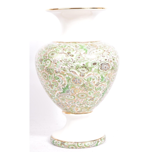 41 - SCC Castelli - A matching pair of later 20th century Italian hand painted and enamelled urn and vase... 