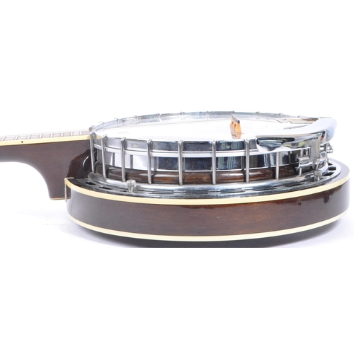 412 - A 20th century Gibson Epiphone Masterbuilt five string banjo. The banjo having a wooden body, with c... 