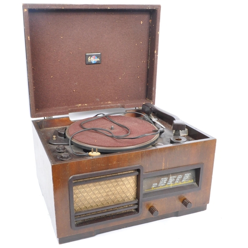 414 - Mullard - A vintage 20th century radio. Together with a G Marconi table top turntable vinyl record p... 