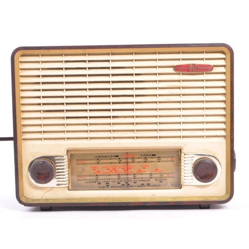 415 - Two vintage 20th century radios. Comprising of a Cambridge, England example with an Ultra radio, wit... 