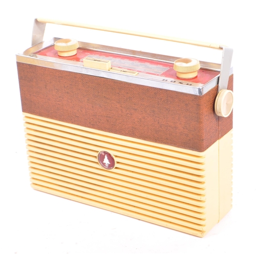 424 - A collection of four mid 20th century portable transistor radios. The collection to include examples... 