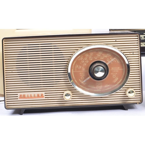 425 - A collection of five mid 20th century bakelite valve radios. The collection to include examples by F... 