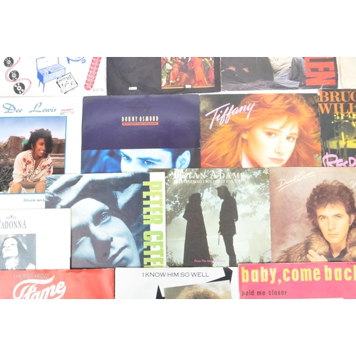 426 - A large collection of 190 later 20th century 45 RPM singles vinyl records. Artists to include; Bee G... 