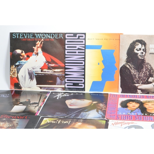 432 - A large collection of 185 later 20th century 45 RPM singles vinyl records. Artists to include; Elton... 