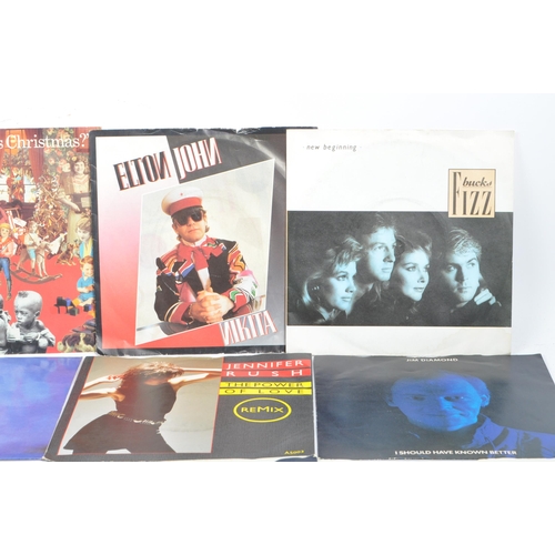 432 - A large collection of 185 later 20th century 45 RPM singles vinyl records. Artists to include; Elton... 