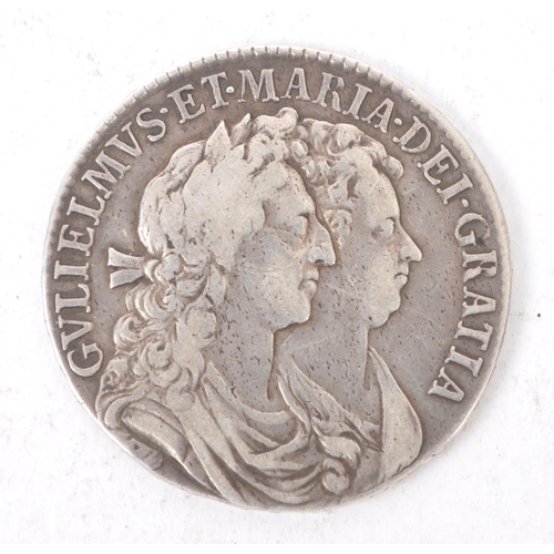 445 - A William & Mary 1689 silver half crown coin.