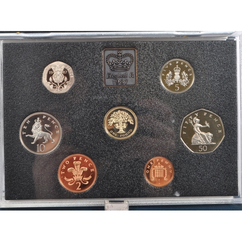 456 - A collection of eighteen United Kingdom Proof Coin Collection sets. The collection from 1983 to 2000... 