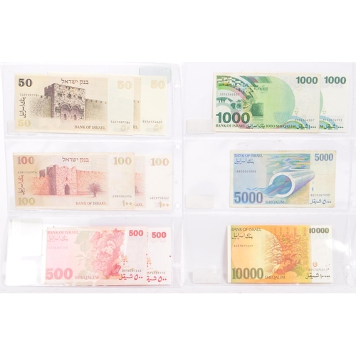 460 - A collection of 20th century uncirculated UNC and very fine Israeli bank notes to include two 1979 5... 