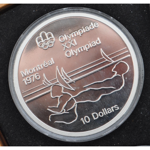 461 - Royal Canadian Mint - Canada 1975 Olympic Coin Proof Set - Set of four .925 silver $5 & $10 dollars ... 